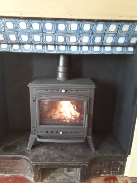 Couvreur ramoneur pour le ramonage d'un poêle à bois à Fécamp 76